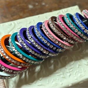 A set of 13 rhinestone colorful rings, perfect condition